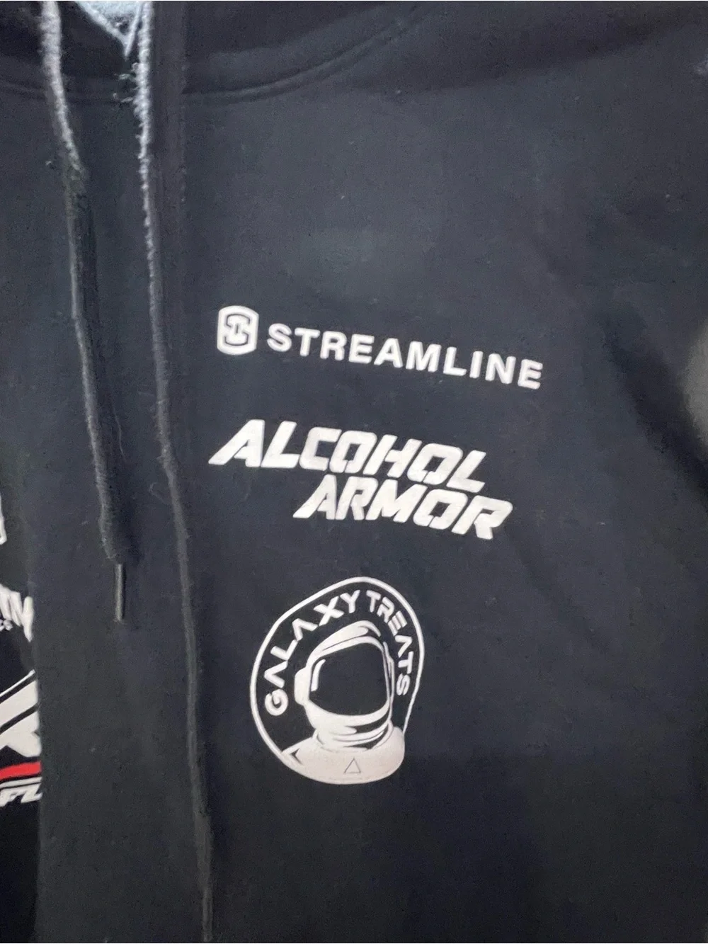 motorsport-style pullover hoodie featuring various sponsor and brand logos